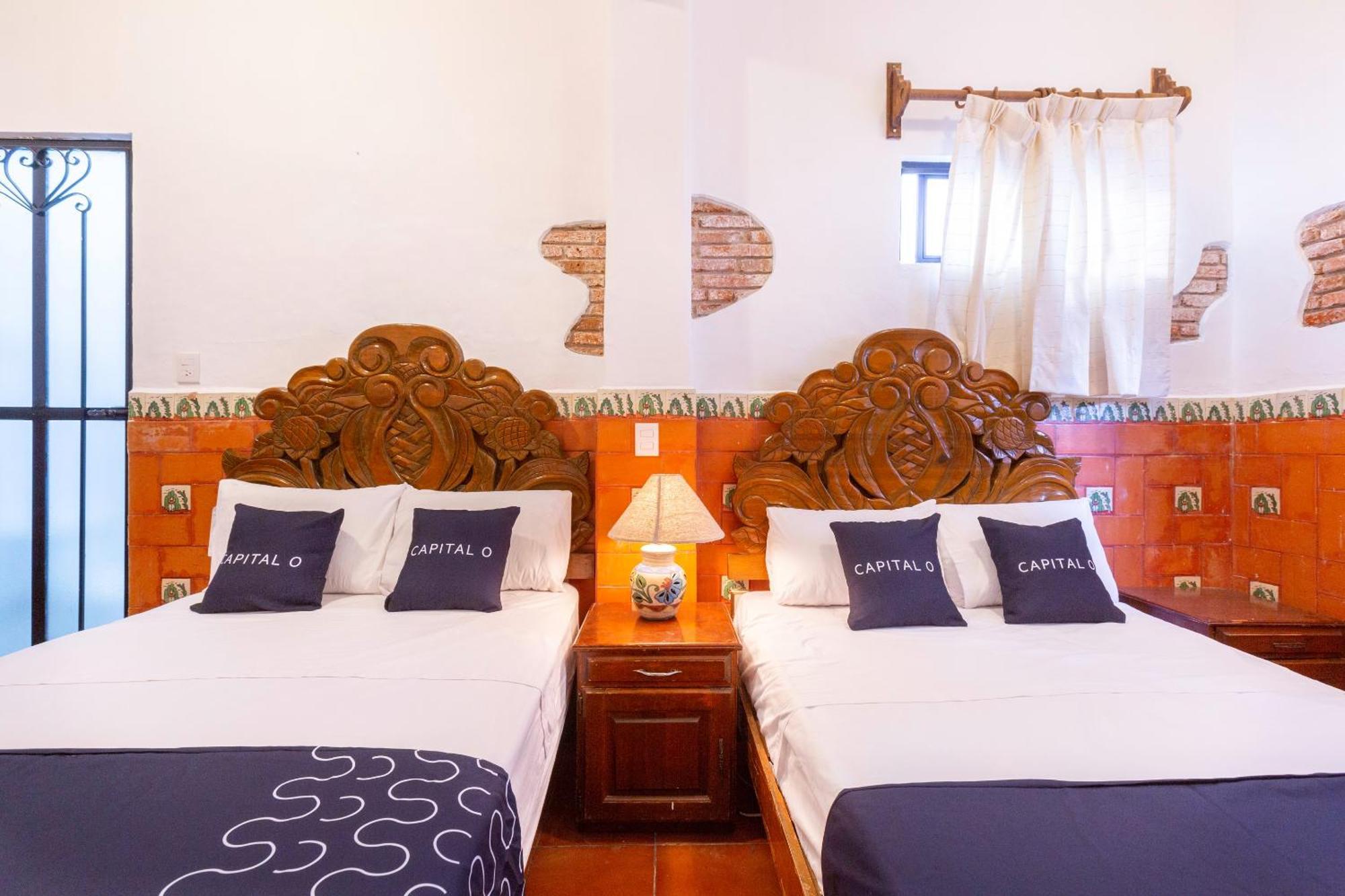 Capital O La Casa De La Tia, Hotel